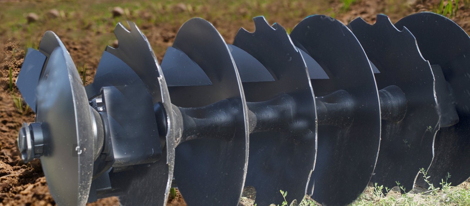 Agricultural disc blades working in soil